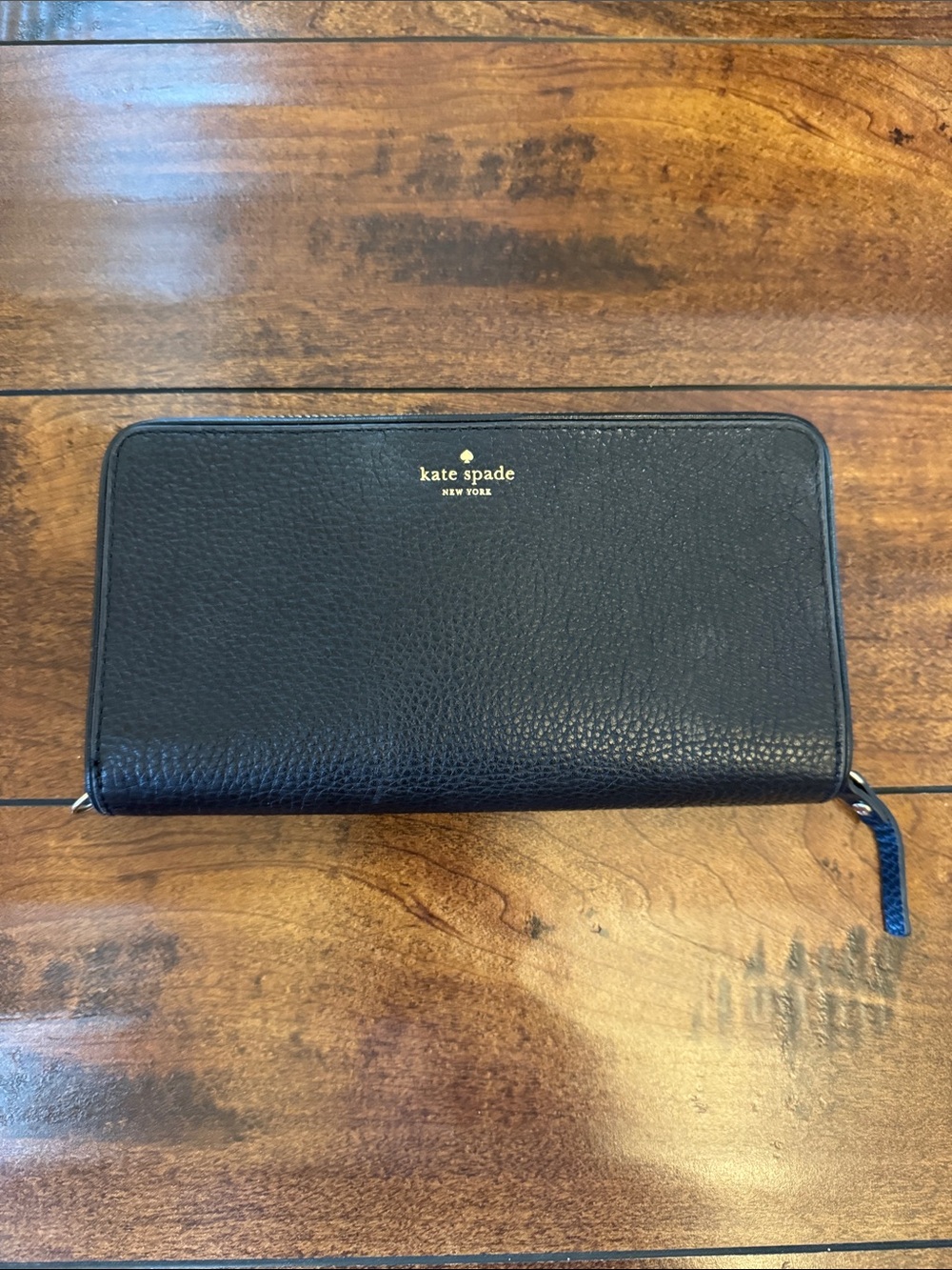 kate spade black pebbled zip-around wallet with gold logo